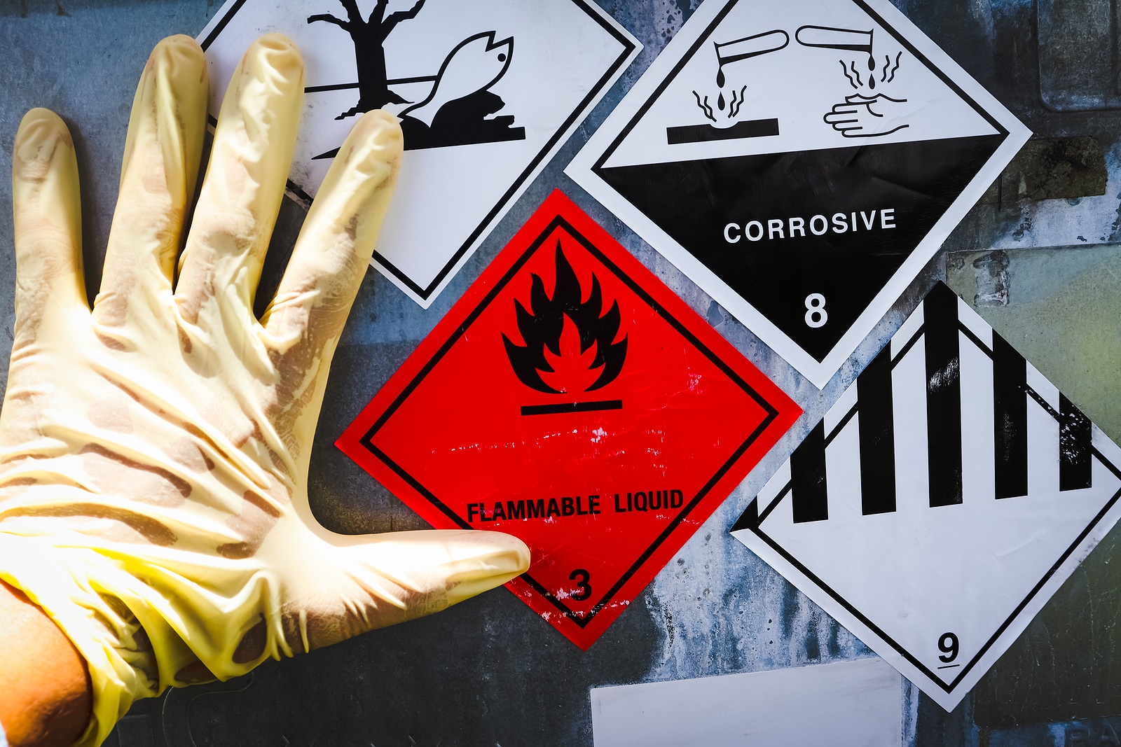 Warning symbol for chemical hazard on chemical container, chemical in factory